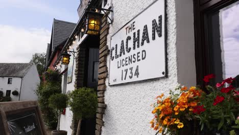 charming pub facade with colorful flowers