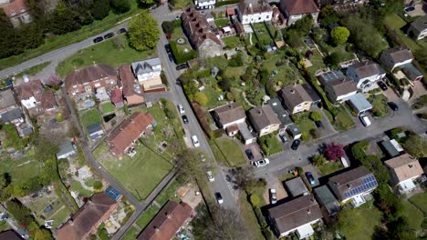 a drone reveal shot of a kent village in england