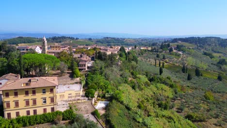 amazing aerial top view flight tuscany medieval village mediterranean wine growing region overflight flyover drone
