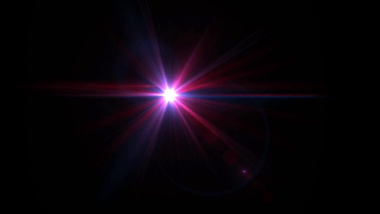 Realistic light lens flare on black background.
