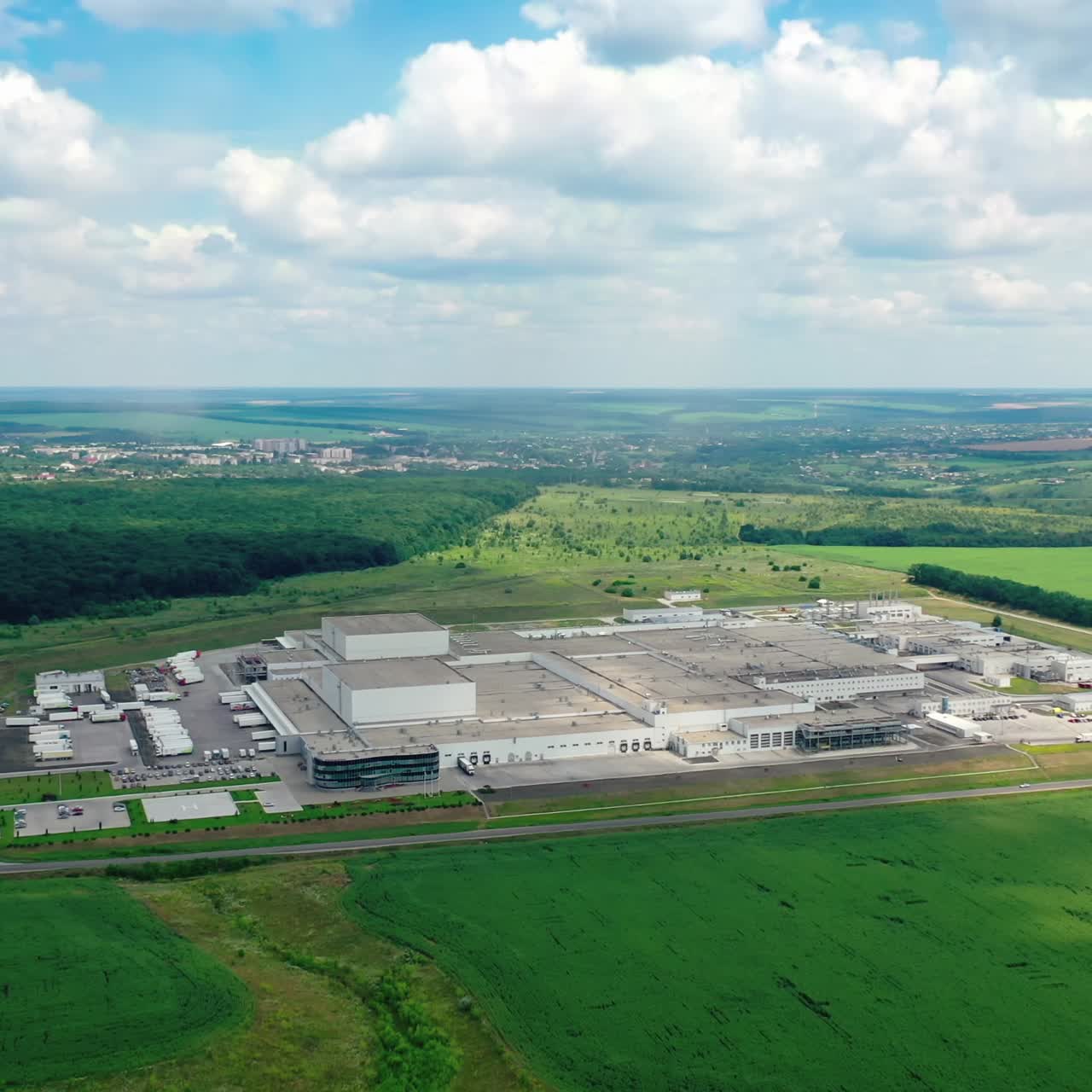 Drone view of factory industrial zone. Logistics center in industrial zone from above