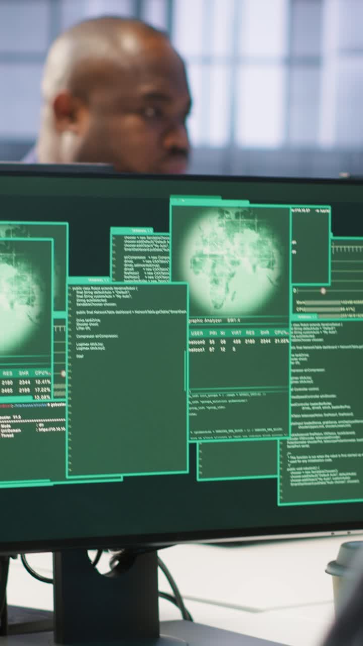 Vertical video Data center colleagues seeing system hacked notification