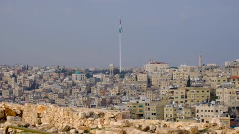 scenic panoramic landscape view overlooking the vast, tightly packed buildings and houses in the densely populated capital city of amman, jordan, middle east