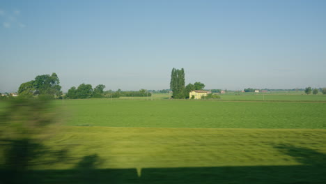 Scenic-Italian-countryside-view-from-a-moving-train-near-Verona