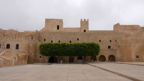 stony walls on territory ancient fortress ribat in monastir city, tunisia