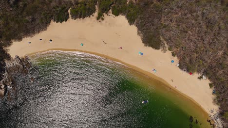 Discovering-El-Organo-Bay,-emerald-green-beaches