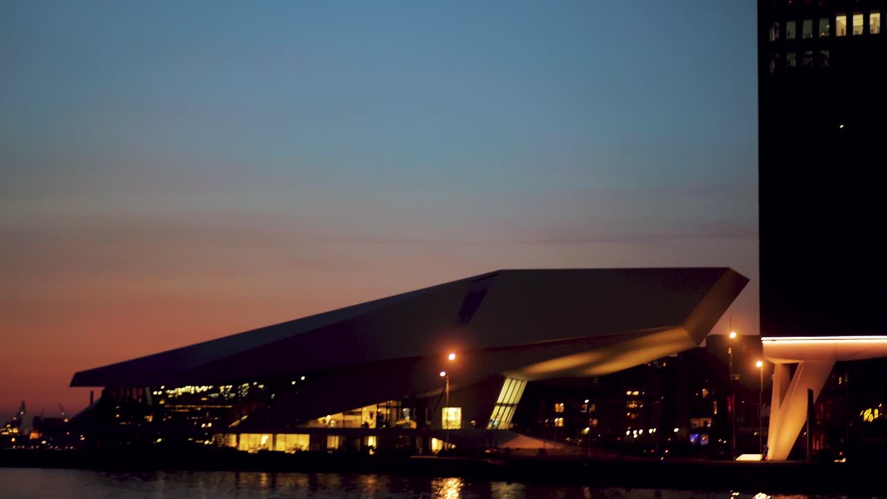 Adam tower in capital city of The Netherlands, Amsterdam buildings at night