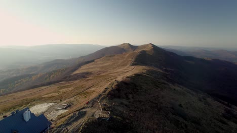 dolly forward aerial view of the mountains of the bieszczady national park in poland, the beginning of the carpathians