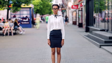 young professional woman on city street