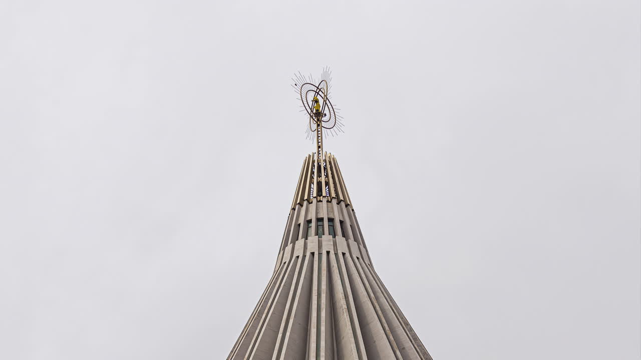 Spire Dome Of Basilica of the Madonna delle Lacrime Against Cloudy Sky In Sicily, Italy