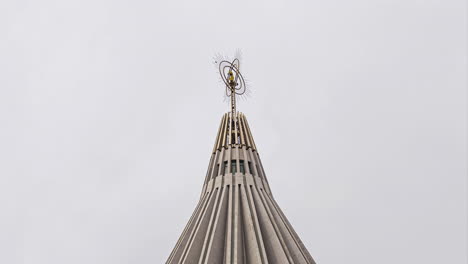 spire dome of basilica of the madonna delle lacrime against cloudy sky in sicily, italy