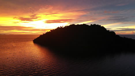 cinematic shot of a tropical island in the indian ocean near madagascar at sunset