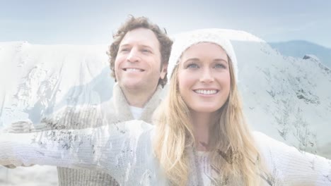 couple in snowy mountains