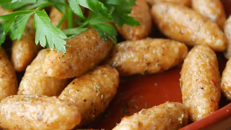 fried meatballs with parsley