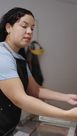 woman carrying a tray of food
