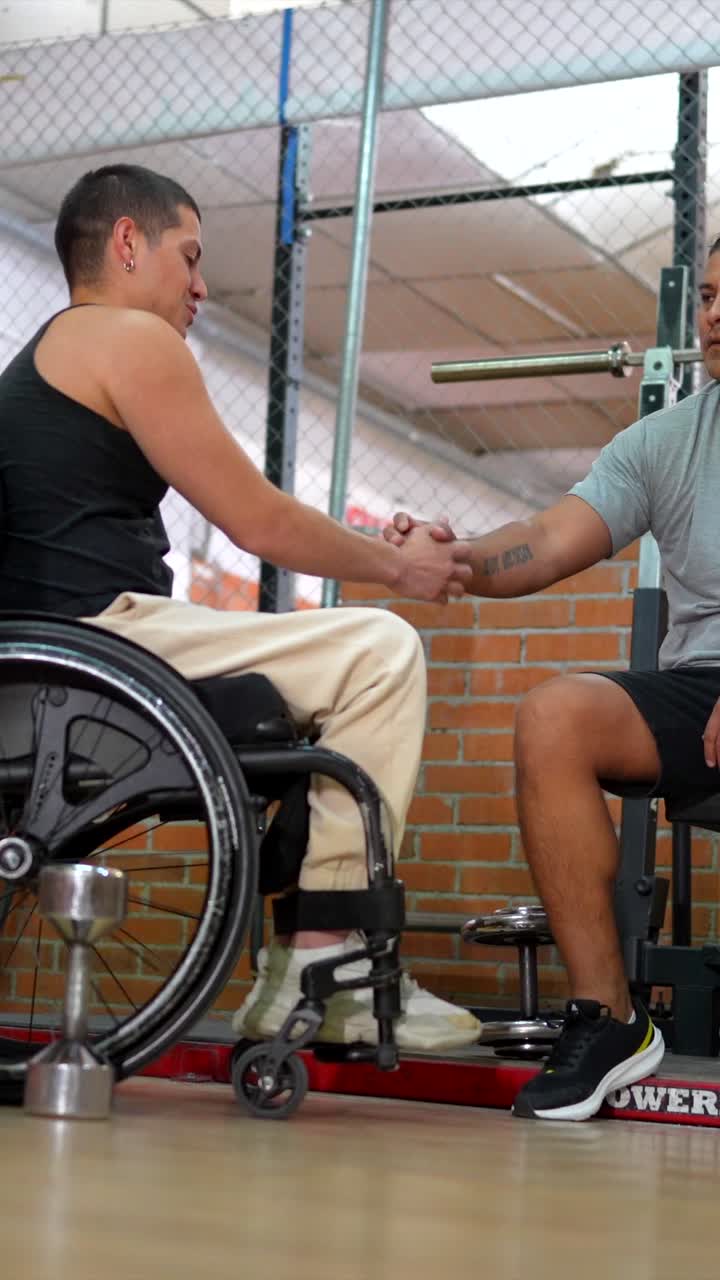 Adaptive Fitness: Men Working Out with Dumbbells in a Gym