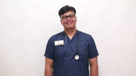 portrait, doctor or happy asian man with smile, confidence and healthcare consultant at clinic