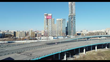 cityscape with highway and under construction buildings