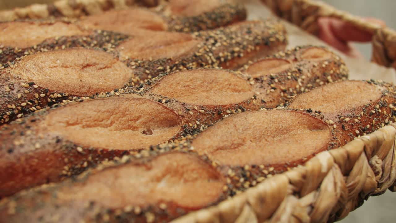 Fresh Artezan bread close-up. Artisan bread is making by skill bakers using natural and high-quality ingredients. Food with health and flavour benefits. Bakery shop and market