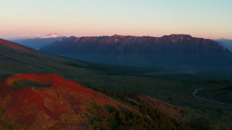 aerial view of the beautiful mountain landscape of chile, golden sunset sky.