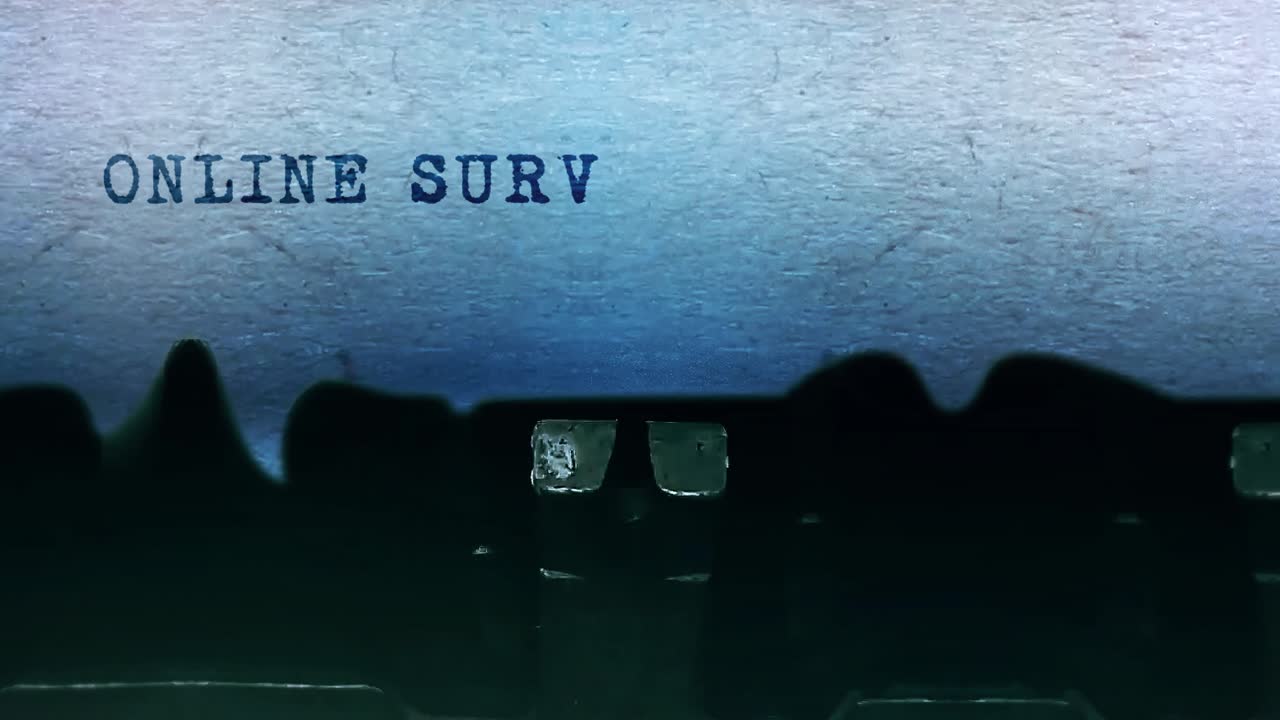 Online survey word closeup being typing and centered on a sheet of paper on old vintage typewriter