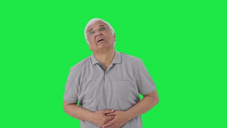 viejo indio enfermo con dolor de estómago pantalla verde