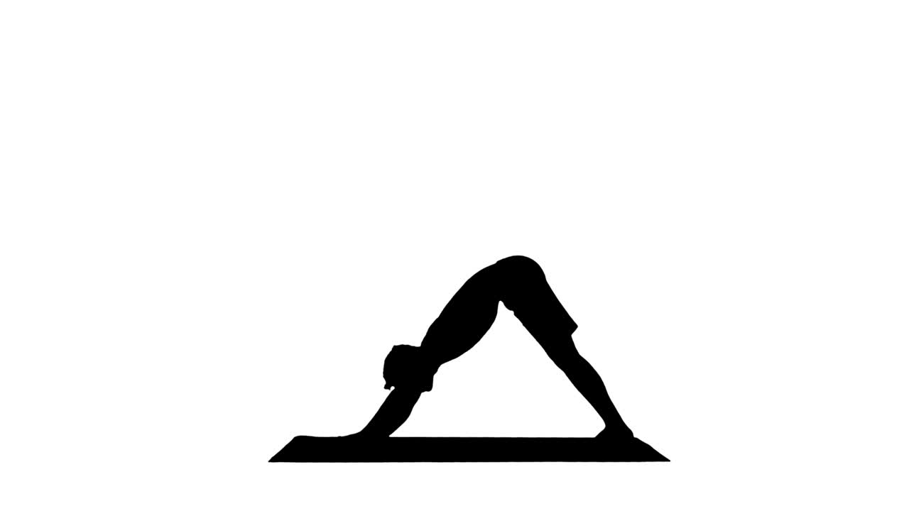 Silhouette Profile of muscular handsome young man working out, standing in yoga upward, downward facing dog pose, then streching his arms