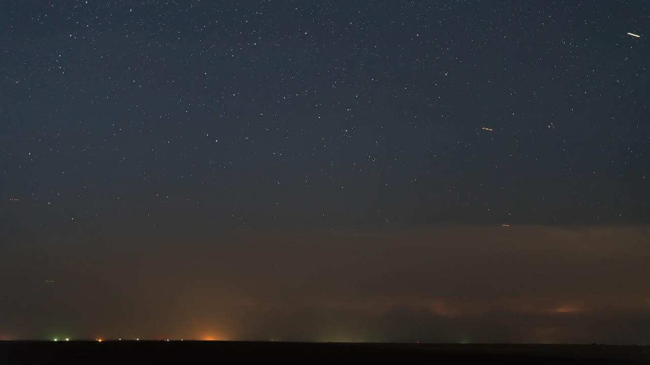 Lightning Storm with Sparkling Stars Captured in Dramatic Time Lapse Motion