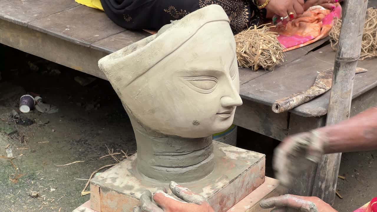 The making of a Durga idol face with clay and hay for the Kolkata's one of the greatest festival, Durga Puja.