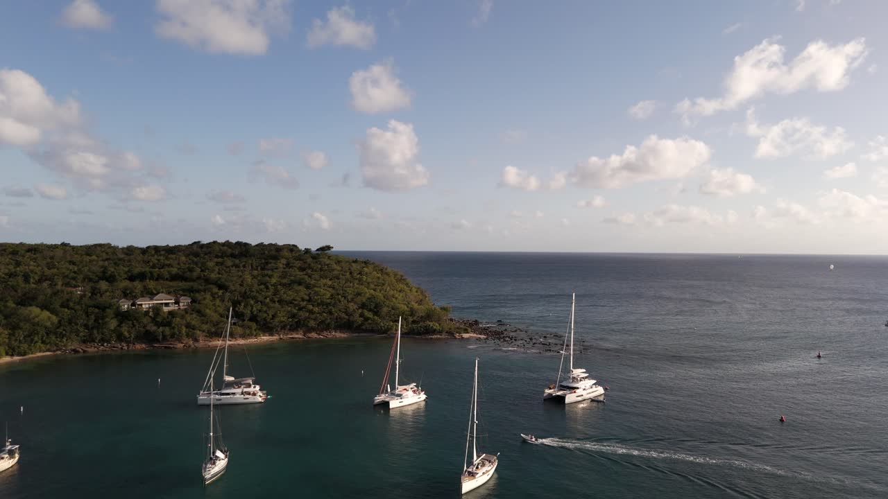 Aerial View of Sailboats and Catamarans in a Tropical Bay
