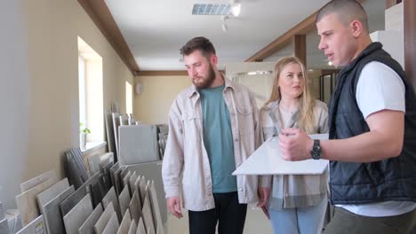 customers selecting tiles in a showroom