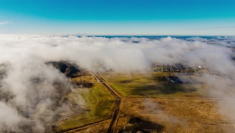 soft clouds slowly sweep across rural jaunolaine latvia during bright spring day