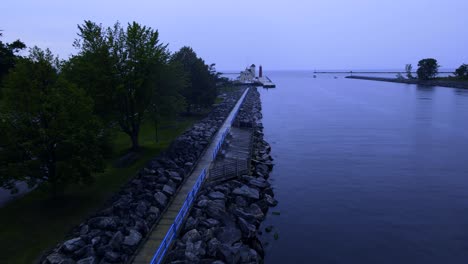 a rainy and gloomy morning over the muskegon channel's south side