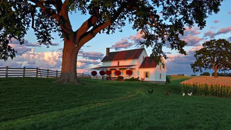 Charming rural scene with a farmhouse at sunset, captured from a low angle