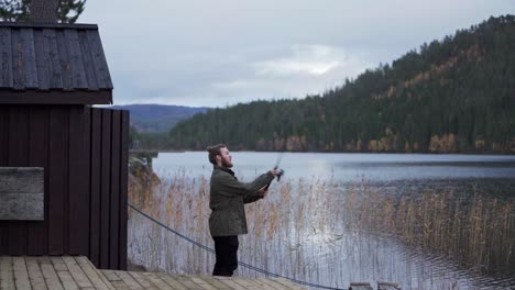 Caucasian-Man-Throwing-His-Fishing-Rod-In-The-River