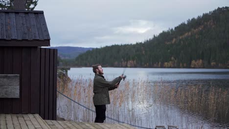Caucasian Man Throwing His Fishing Rod In The River