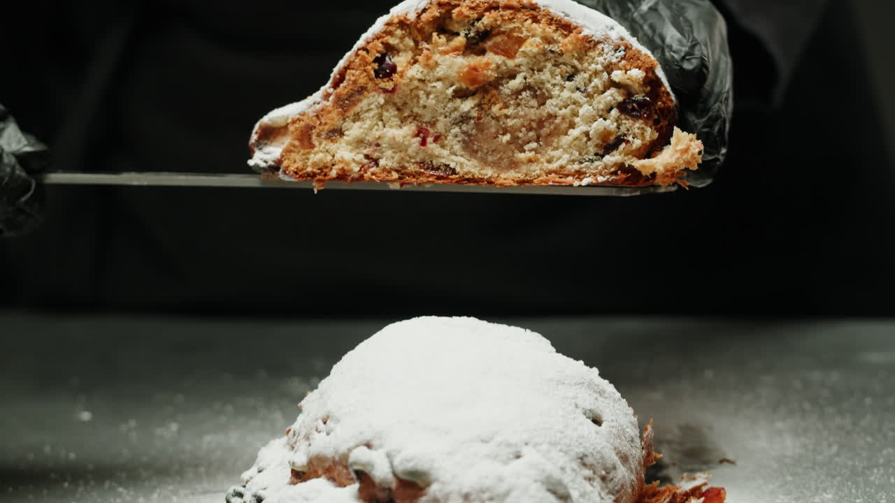 Chef Cutting a Festive Christmas Stollen