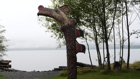 totem pole at potlatch totem park and museum in ketchikan, alaska.