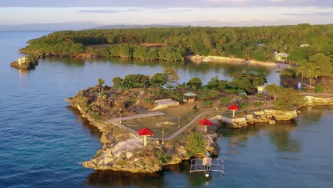 Aerial-Drone-Shot-of-Relaxing-Resort-by-Tropical-Lagoon