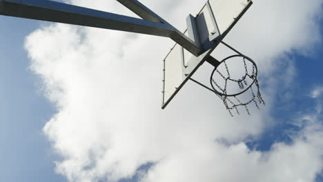 basketball player scoring a dunk