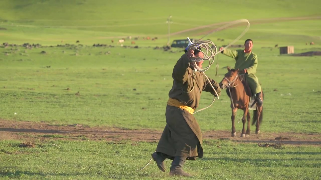 Mongolian Herdsmen Lassoing Horses on the Steppe