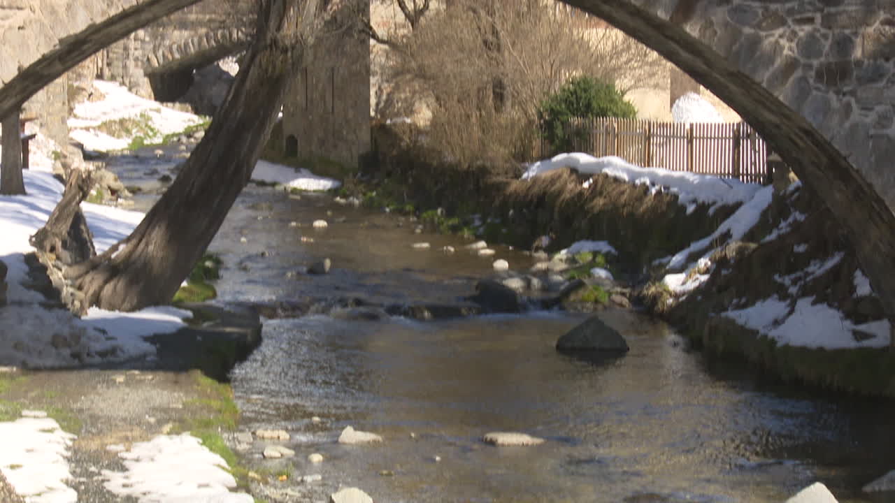 Snowy Mountain Village Bridge