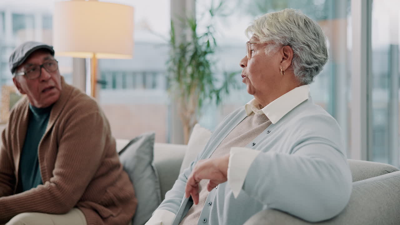 An elderly couple at home