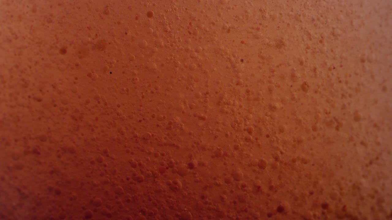 Close-up of the surface of the sun liquid texture background