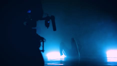 modern dance is recorded by camera operator