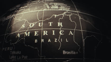 close-up of a vintage globe focusing on south america