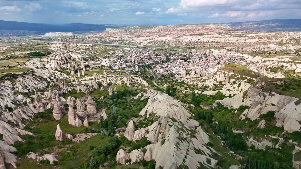 Aerial view of Cappadocia's unique rock formations in peaceful setting