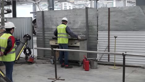 factory workers training on welding and maintenance