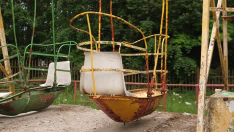 Abandoned-and-empty-amusement-park-swinging-ship-in-the-Chernobyl