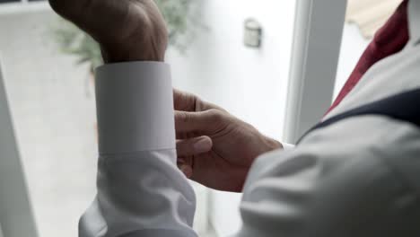 The-groom-prepares-for-the-ceremony-where-he-will-marry